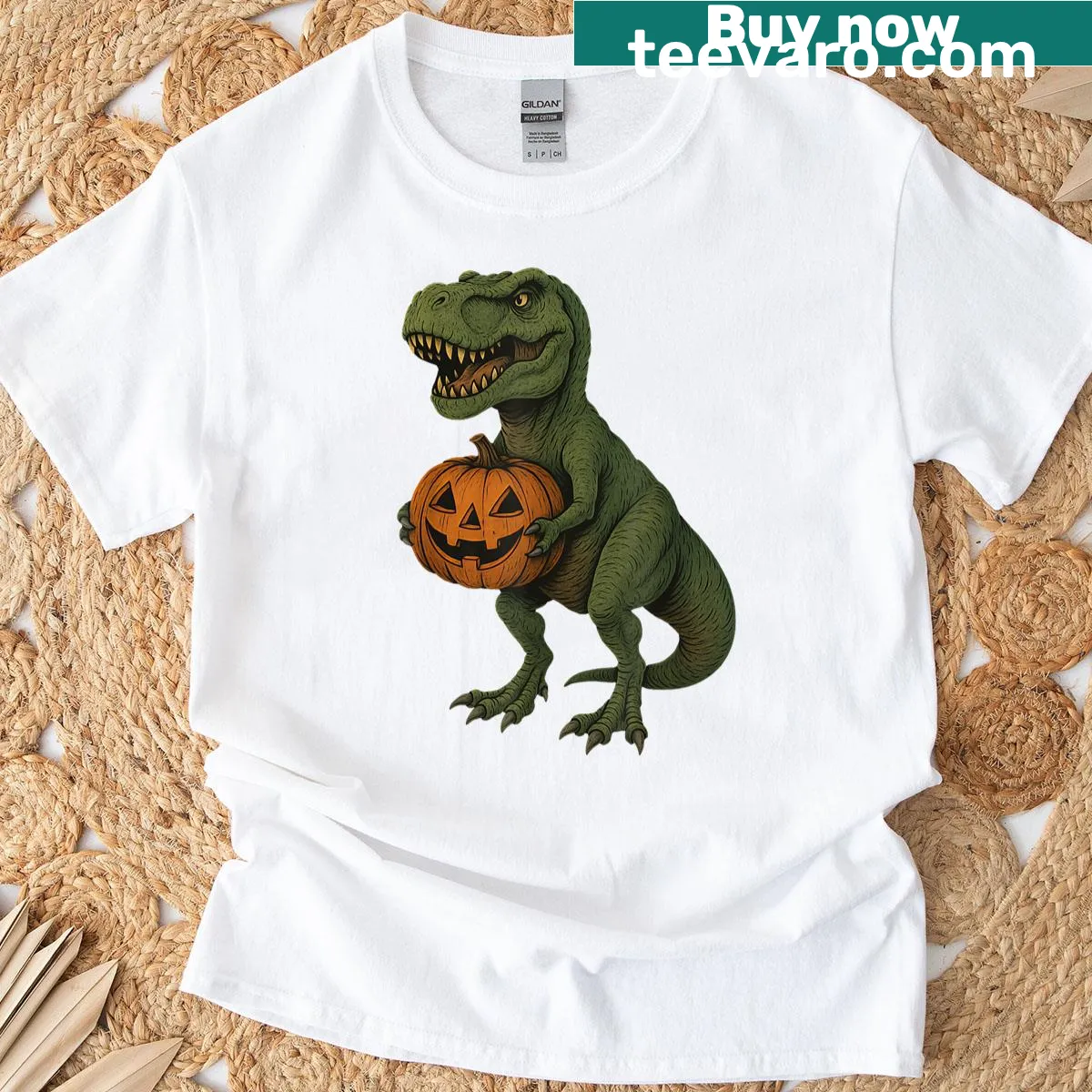 T-rex dinosaur jack-o-lantern Halloween t-shirt design — on a men's t-shirt