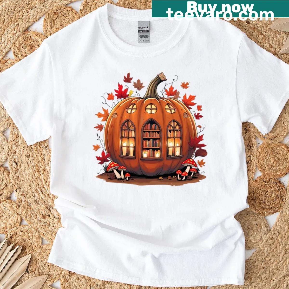 Illustrated T-shirt featuring a whimsical pumpkin library design. — on a men's t-shirt