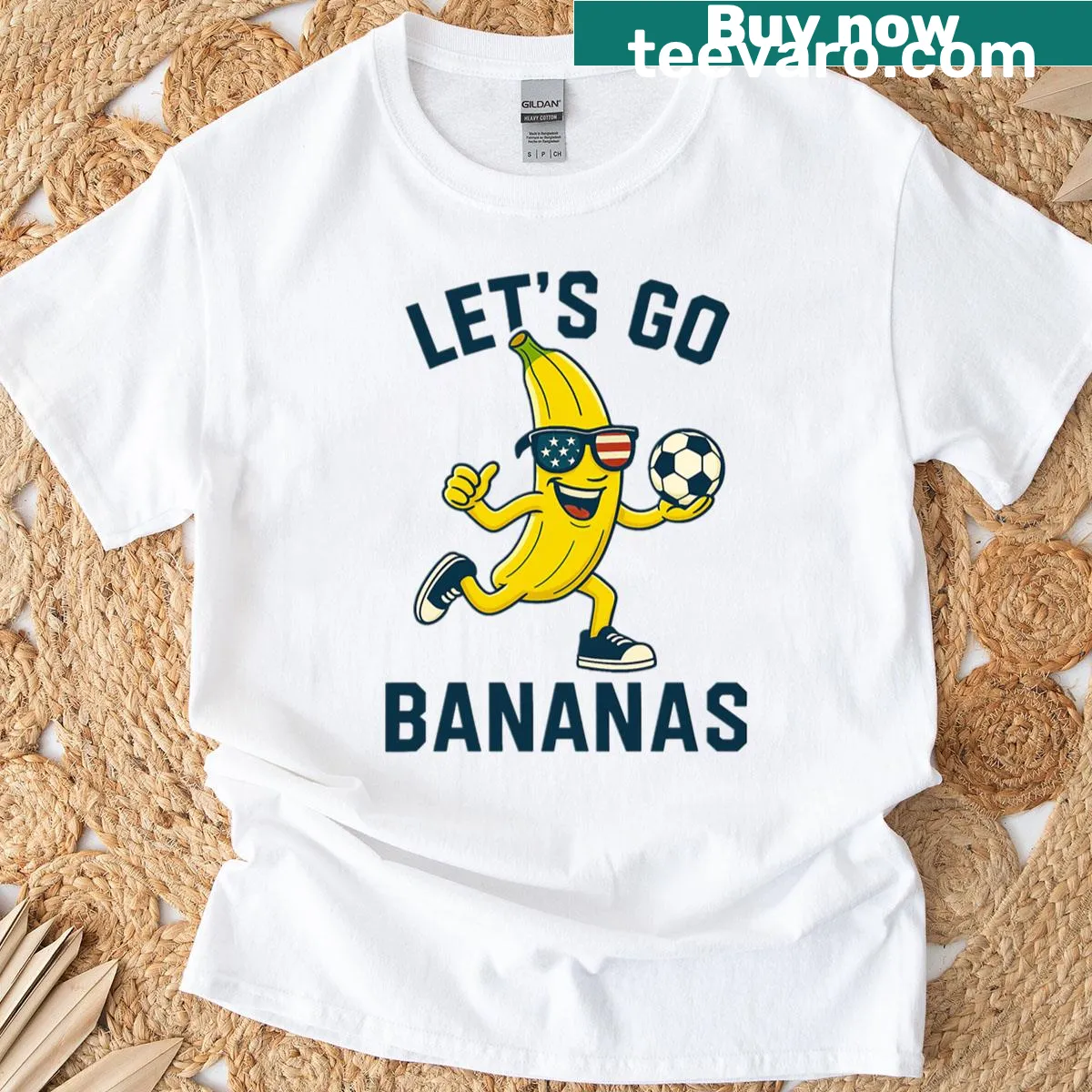Cartoon banana soccer player in sunglasses design T-shirt — on a men's t-shirt