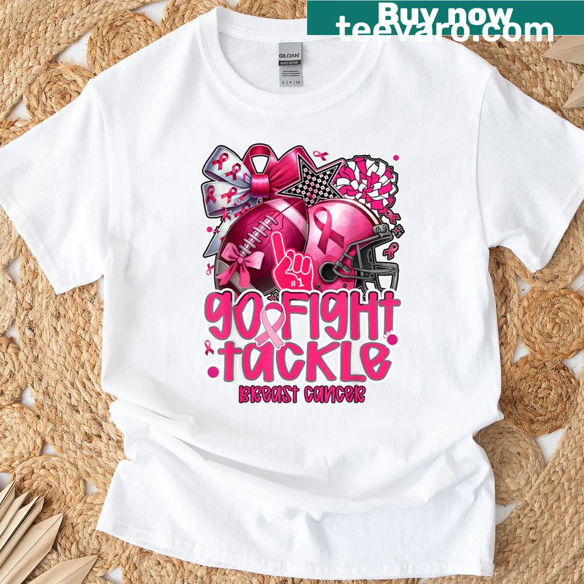 Pink T-shirt promoting breast cancer awareness with football and cheer graphics — on a men's t-shirt