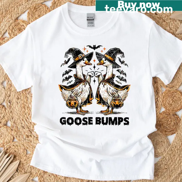 Halloween shirt with a funny ghostly goose and pumpkin graphic