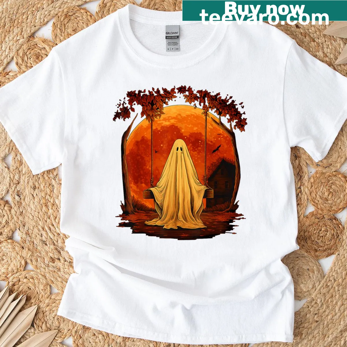 Cheerful ghost swinging under a red moon for Halloween — on a men's t-shirt