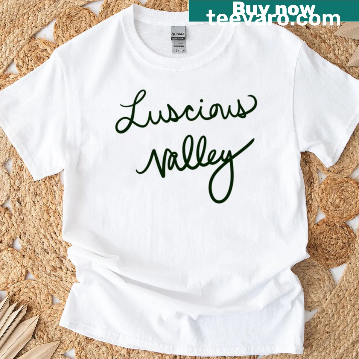 T-shirt featuring a serene illustration of a lush valley — on a men's t-shirt