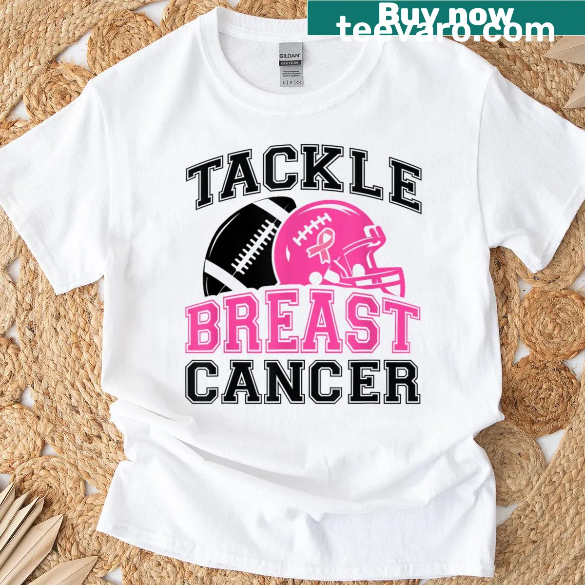 Pink football helmet awareness T-shirt for cancer support — on a men's t-shirt