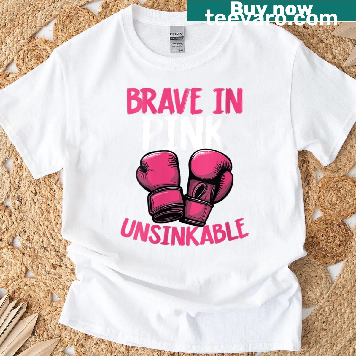 Inspirational 'Brave In Pink Unsinkable' text on breast cancer awareness t-shirt — on a men's t-shirt