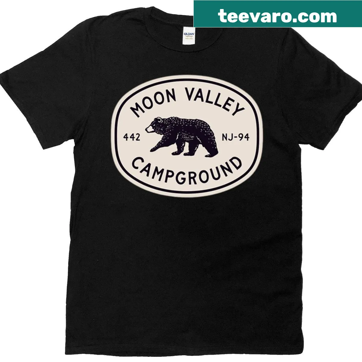 Retro camping badge tee with bear illustration for outdoor lovers — on a men's t-shirt