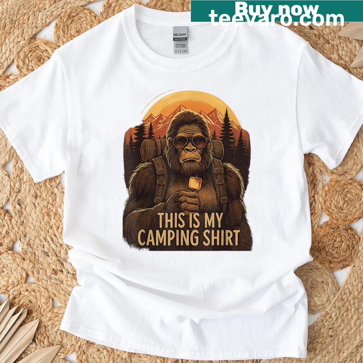 Cartoon Bigfoot graphic t-shirt for camping enthusiasts — on a men's t-shirt