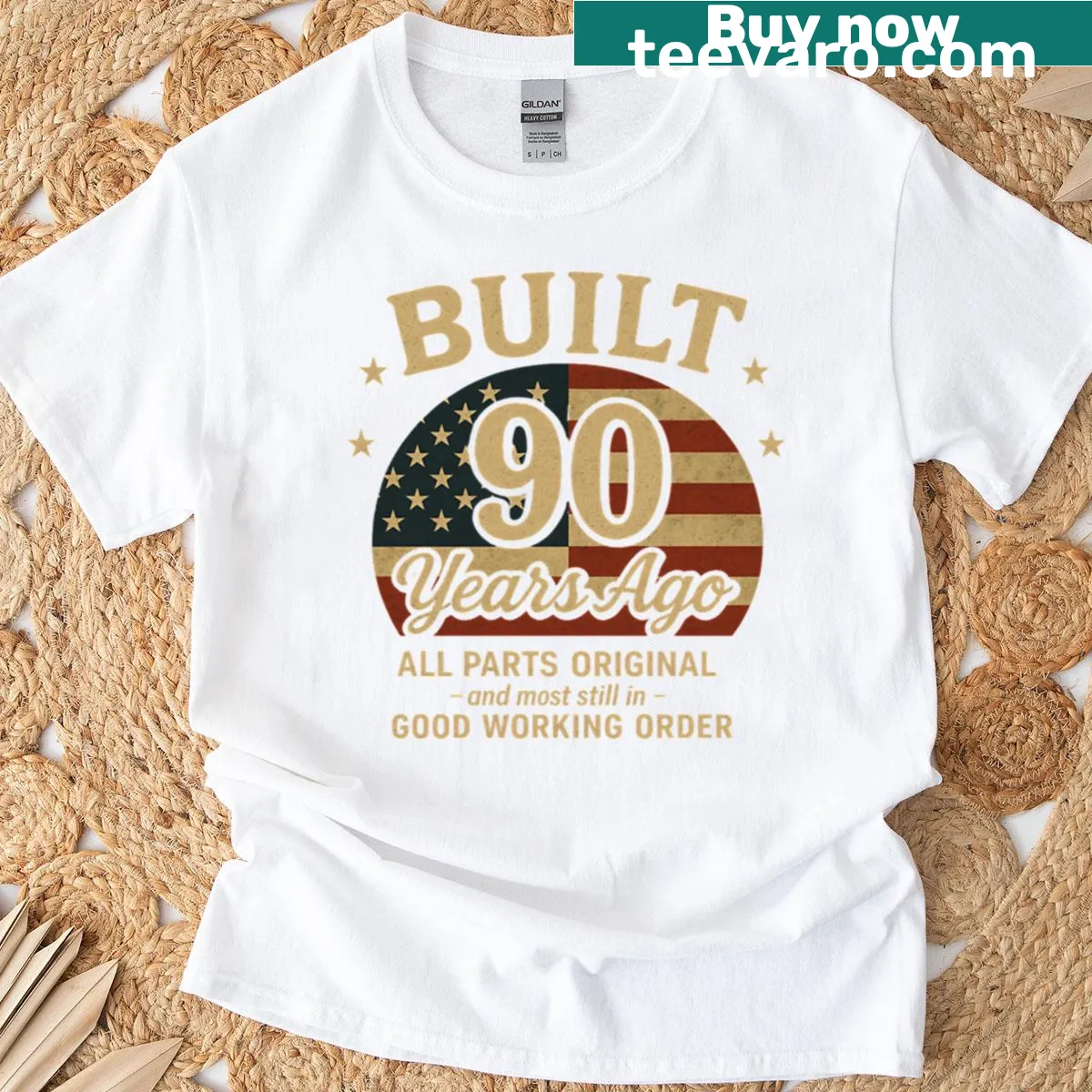 Vintage distressed T-shirt with 'Built 90 Years Ago' from 1935 — on a men's t-shirt