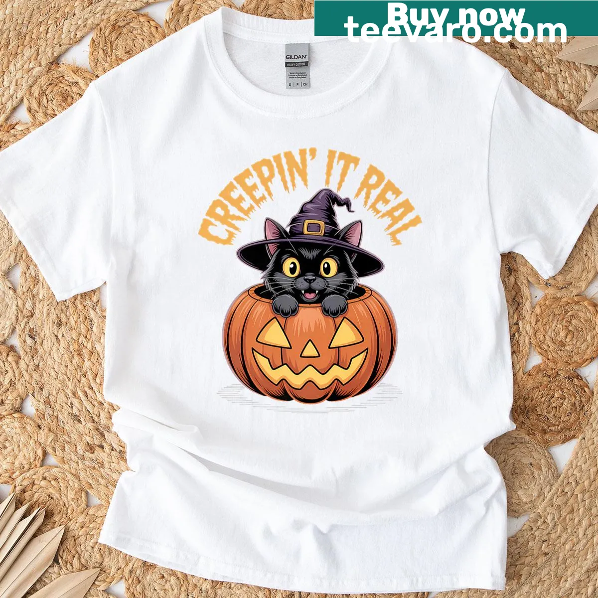 Cute cartoon black cat in a witch costume graphic tee. — on a men's t-shirt