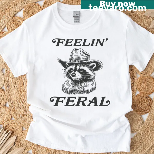 Vintage-style T-shirt featuring a funny cowboy raccoon graphic
