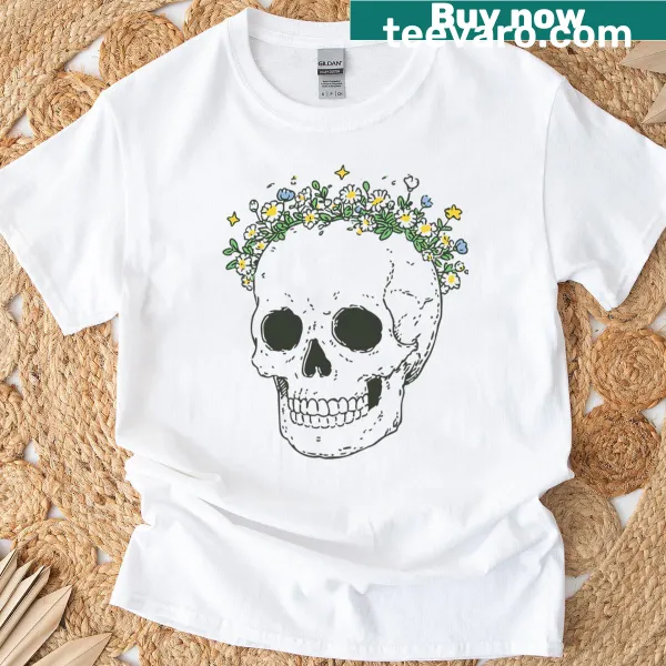 Gothic skull design surrounded by blooming flowers on a t-shirt