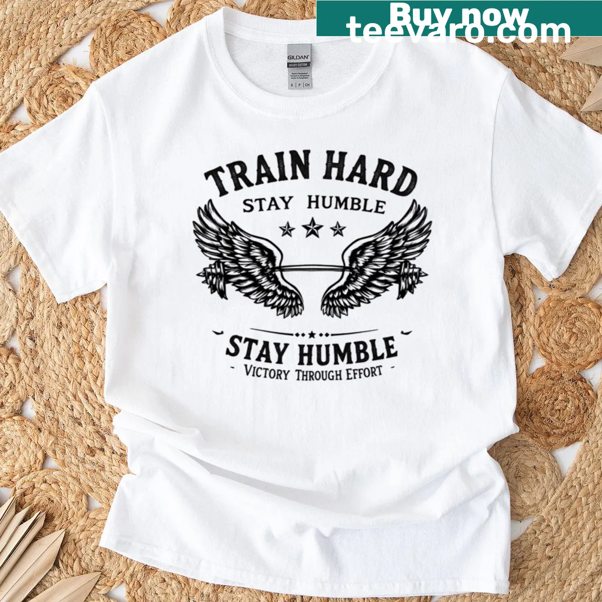 Motivational humble training typography design t-shirt — on a men's t-shirt