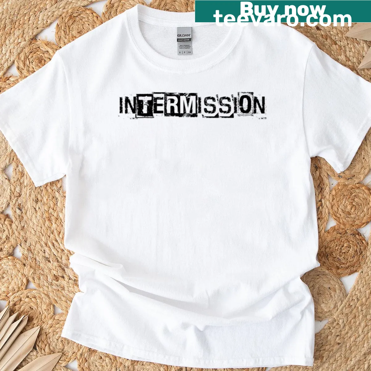 Distressed oversized tee featuring vintage punk band logo — on a men's t-shirt