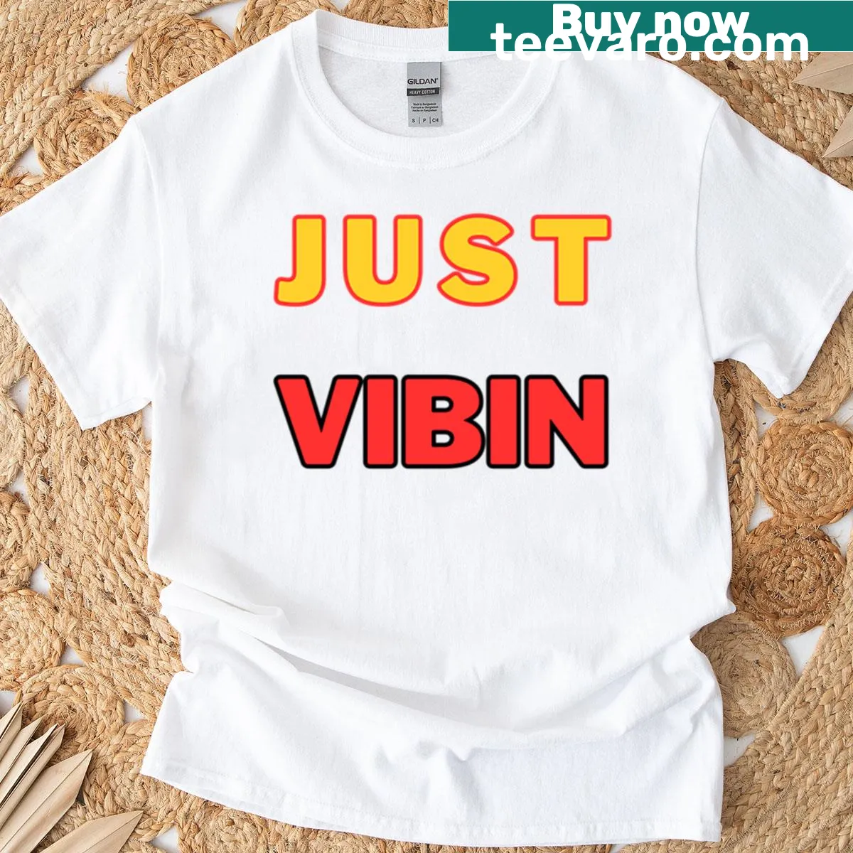 Retro typography t-shirt with the phrase Just Vibin — on a men's t-shirt