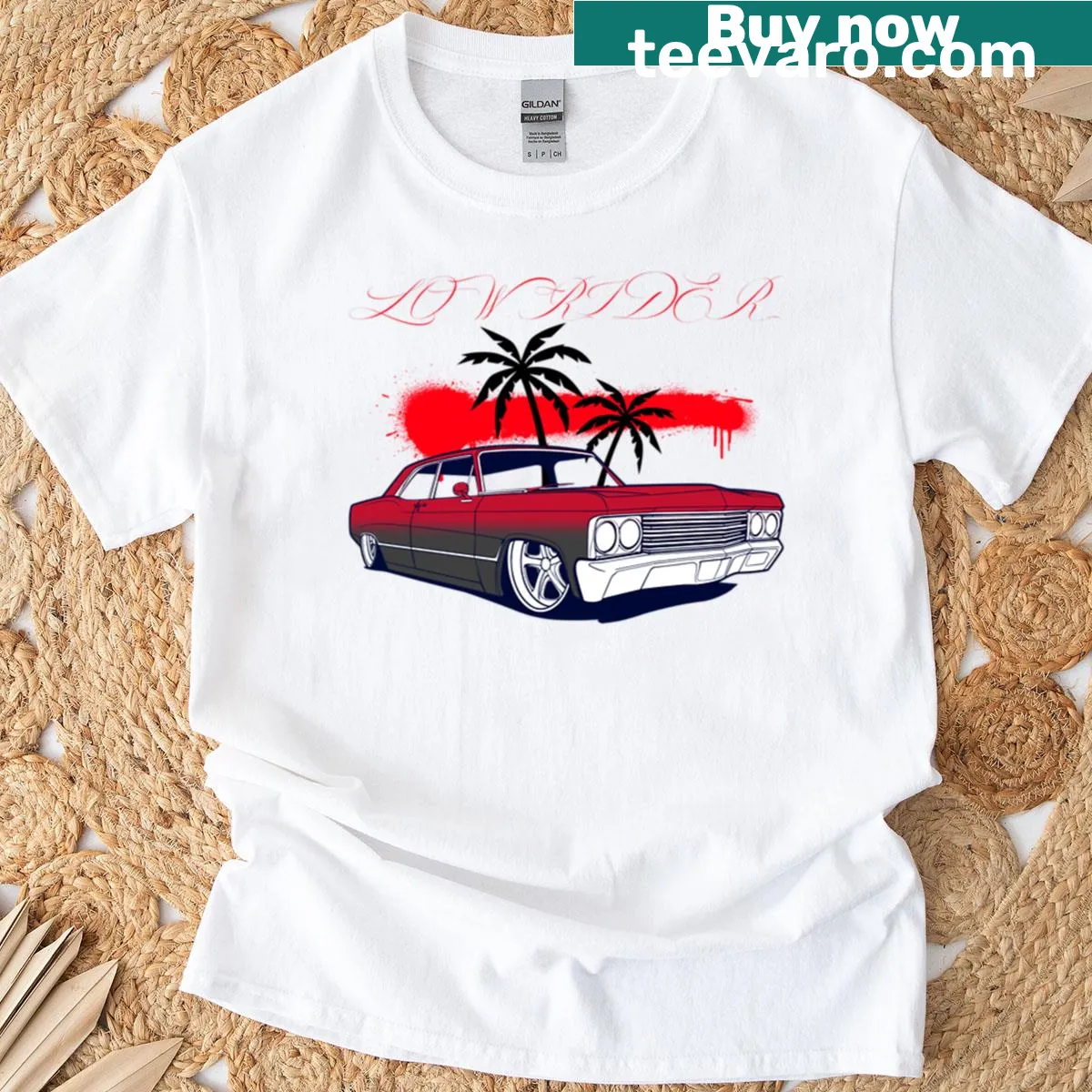 T-shirt featuring a low rider Chevy illustration — on a men's t-shirt