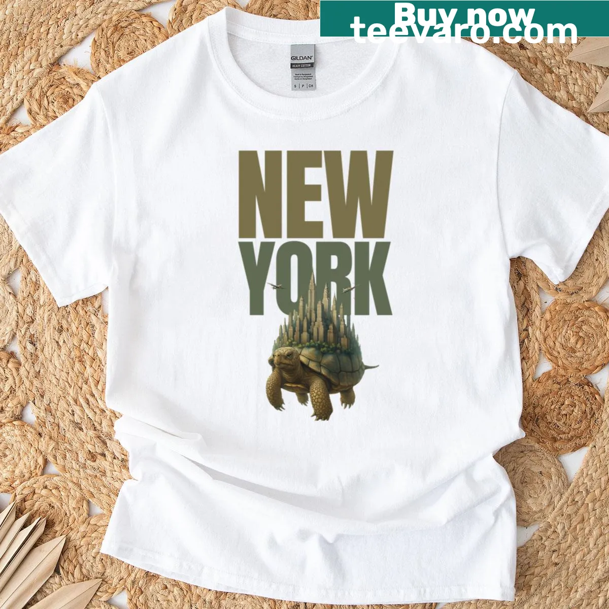 Vintage-style t-shirt featuring a tortoise with NYC landmarks — on a men's t-shirt
