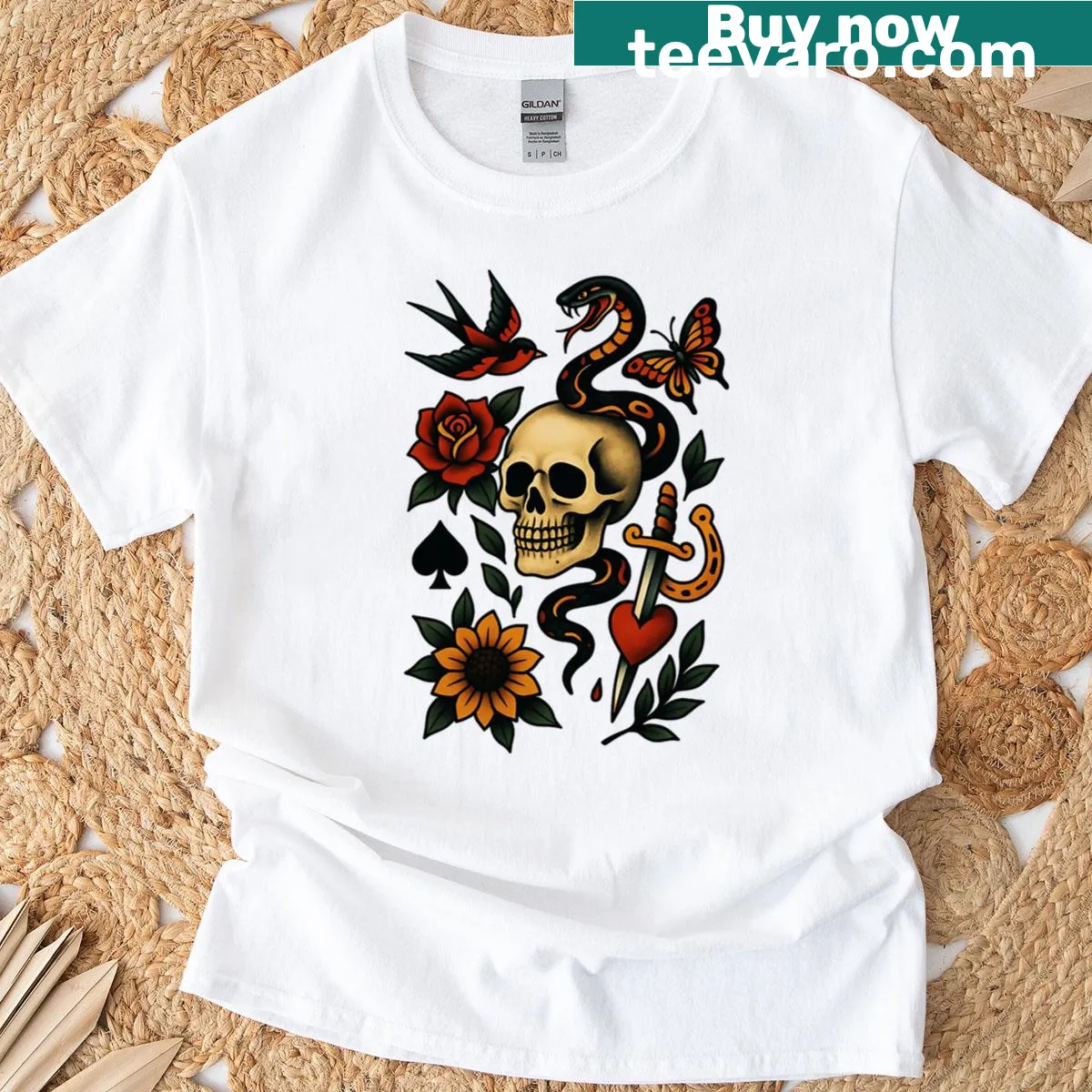 Tattoo design featuring a skull, snake, rose, and dagger — on a men's t-shirt