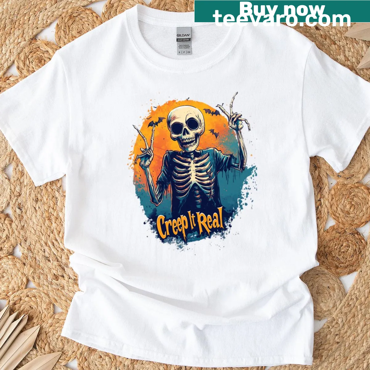 Vintage Halloween t-shirt featuring a skeleton graphic in orange and blue — on a men's t-shirt