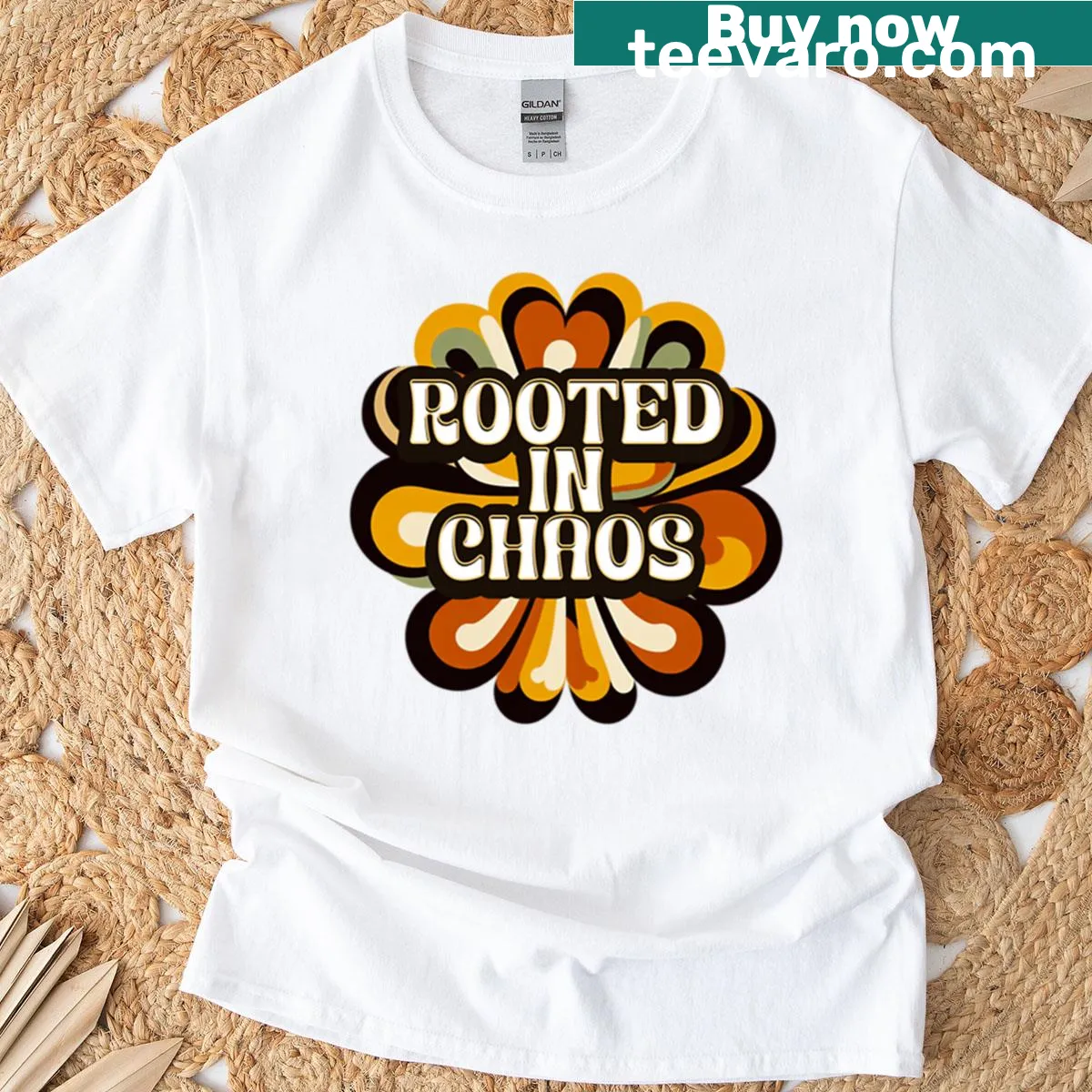 Oversized T-shirt with playful typography saying 'Rooted In Chaos' — on a men's t-shirt