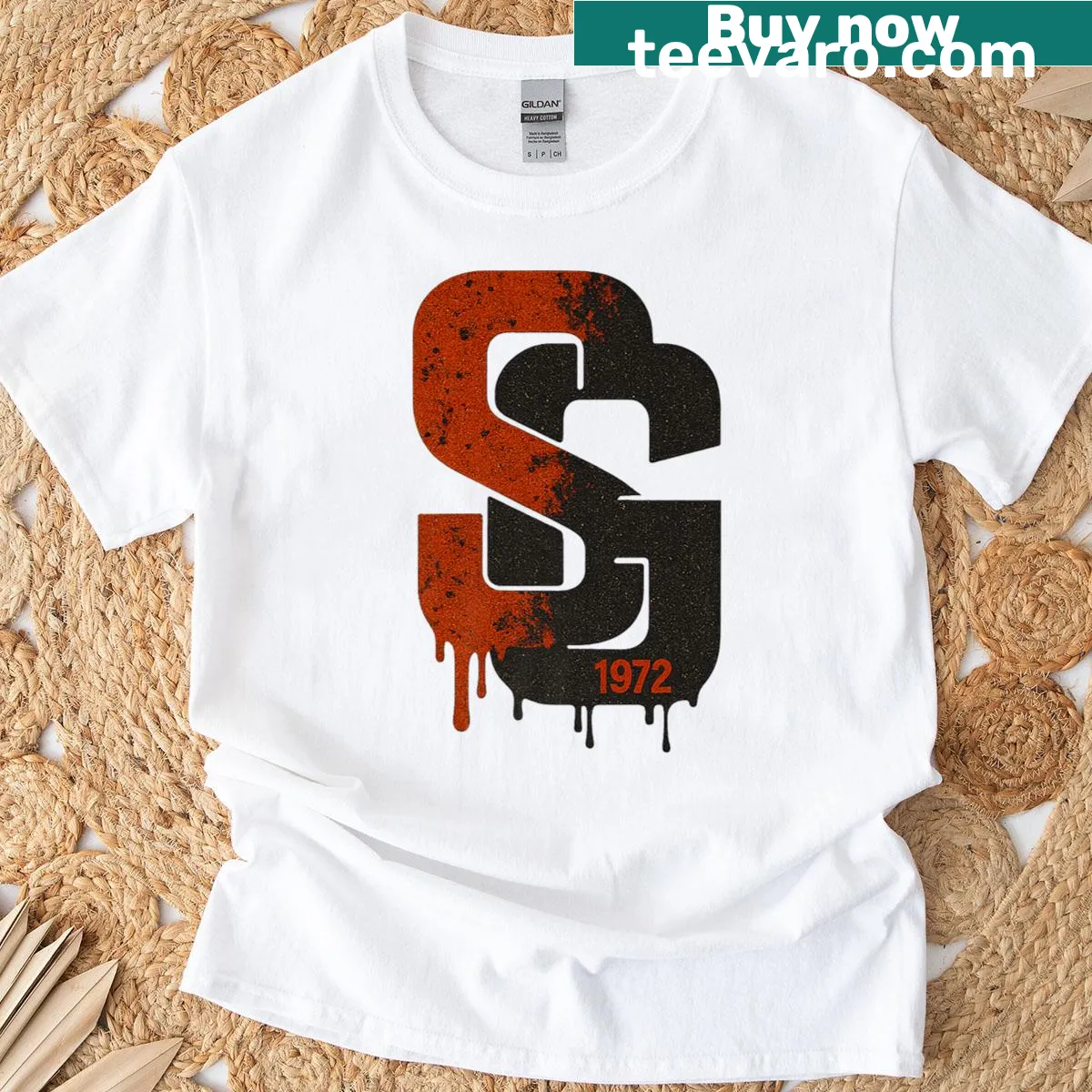 Athletic T-shirt with humorous 'initial drip' graphic design — on a men's t-shirt