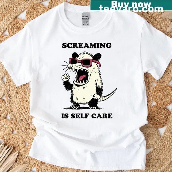Oversized T-shirt with the phrase 'Screaming Is Self Care' in a fun design