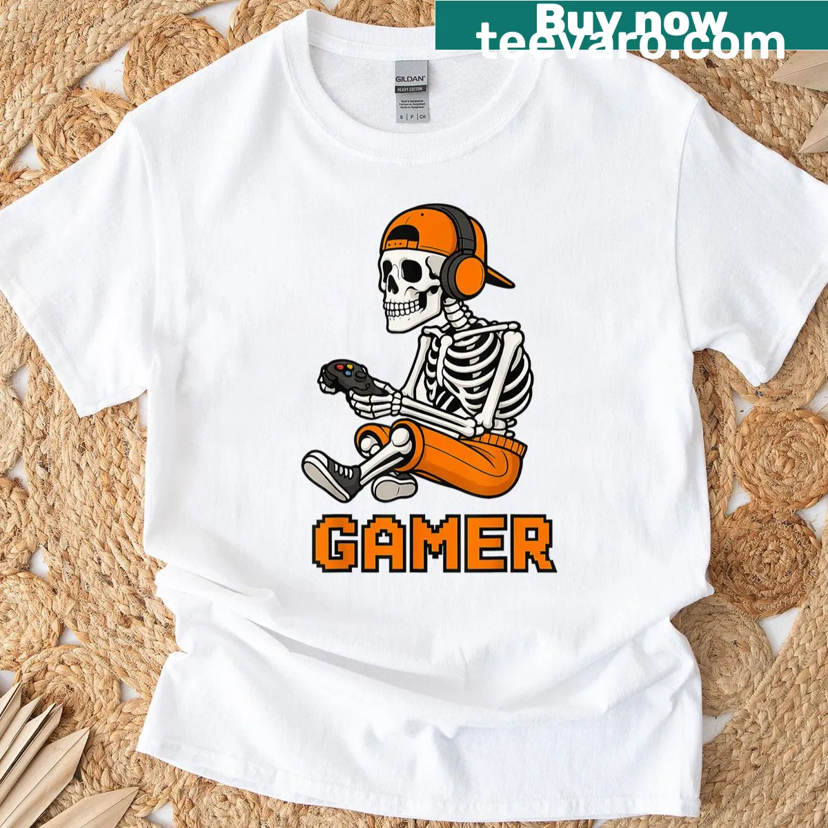 Skeleton gamer focused on video game with spooky Halloween elements — on a men's t-shirt