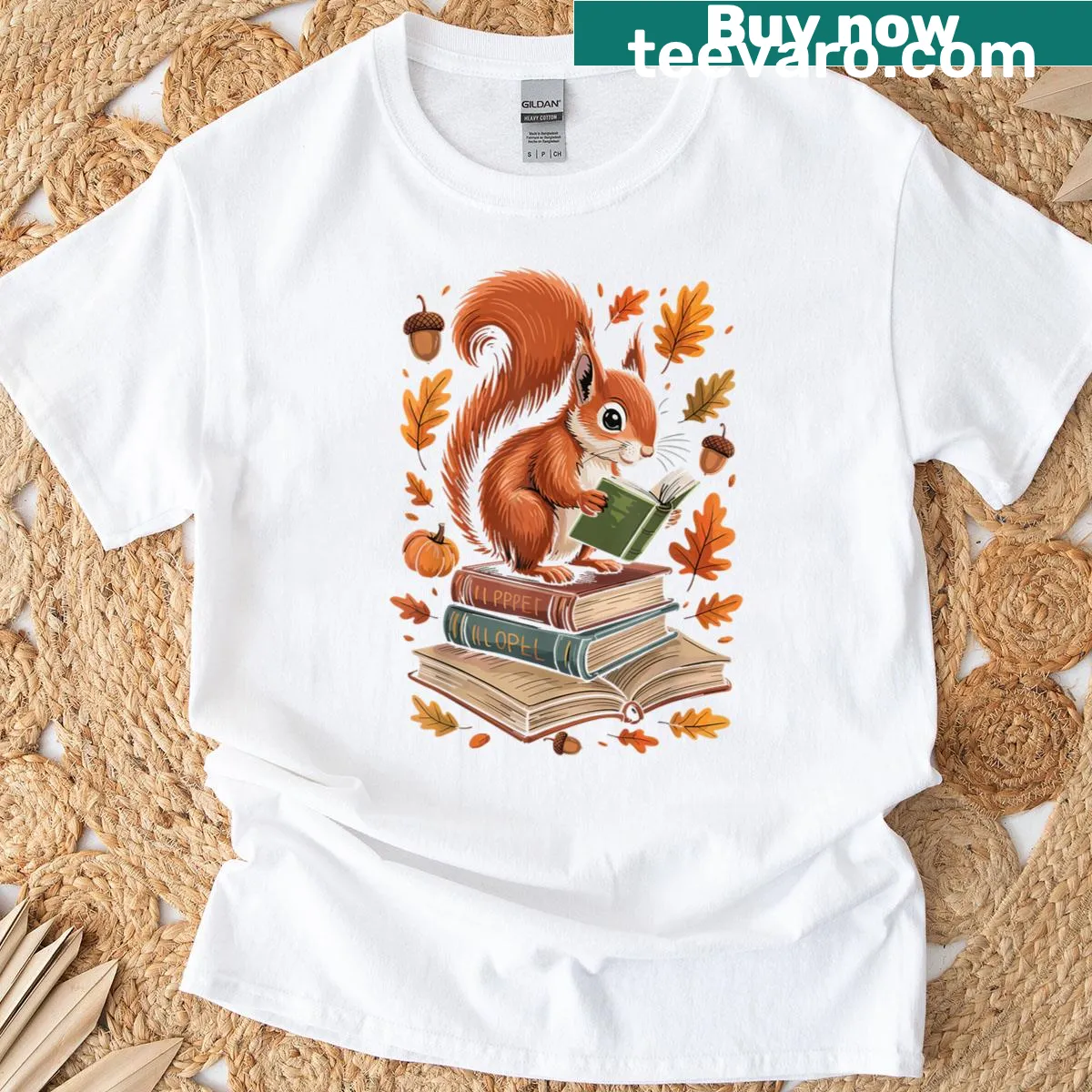 Whimsical shirt of a squirrel reading among fall leaves — on a men's t-shirt