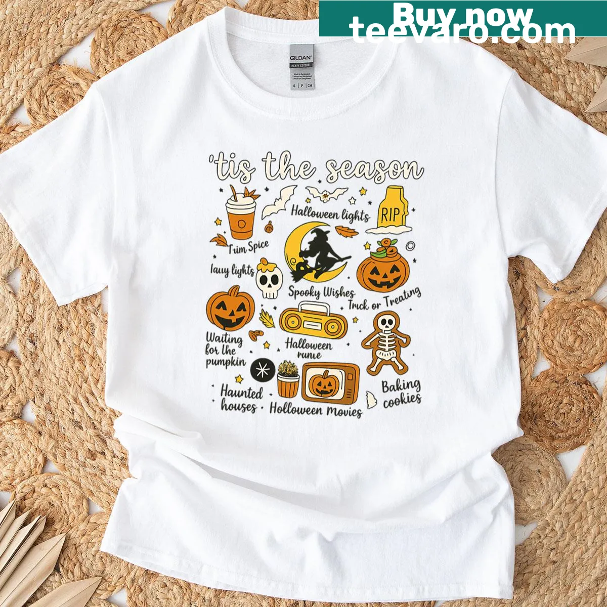 Retro Halloween women's t-shirt with whimsical pumpkins and witches design — on a men's t-shirt