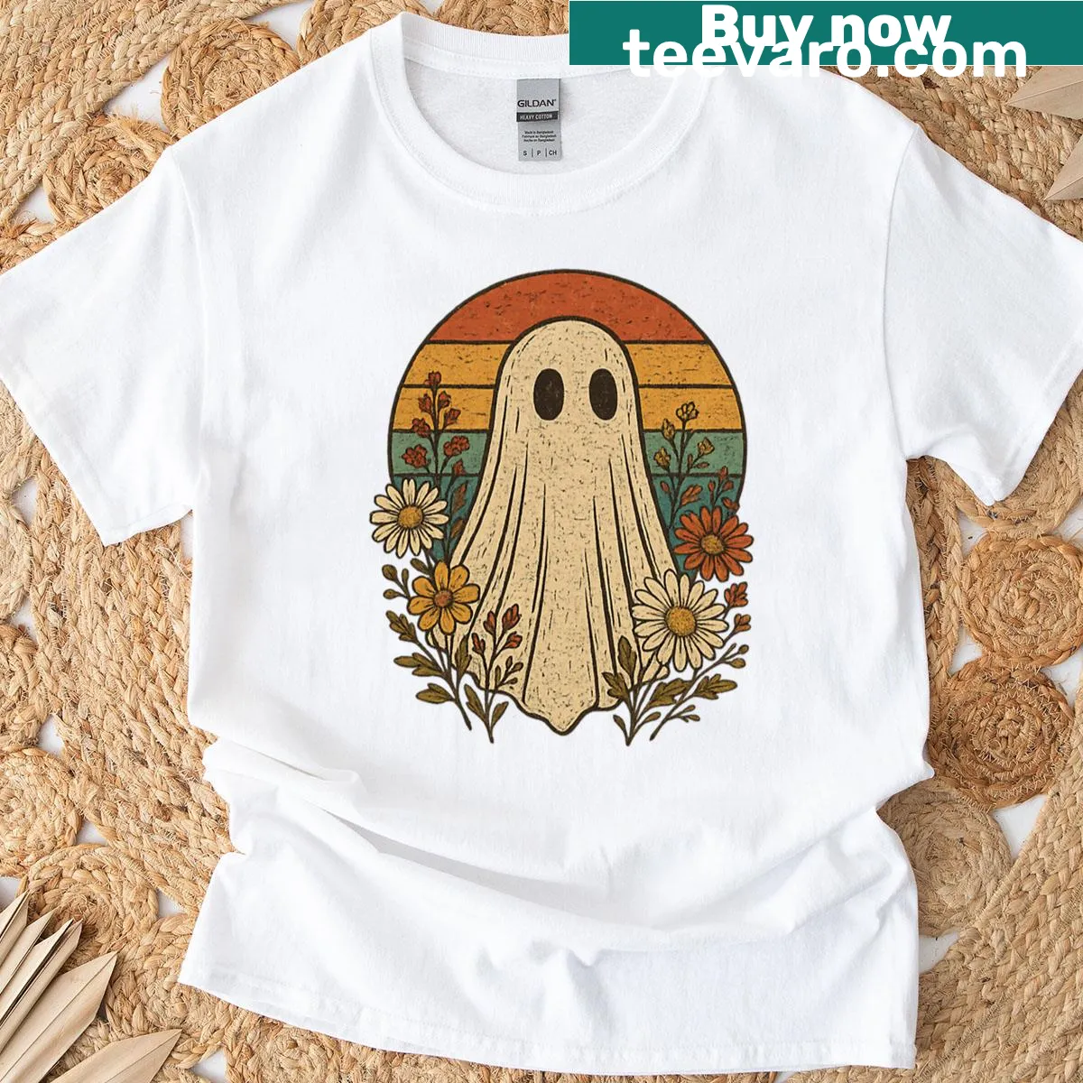 Whimsical ghost t-shirt with floral sunset design — on a men's t-shirt