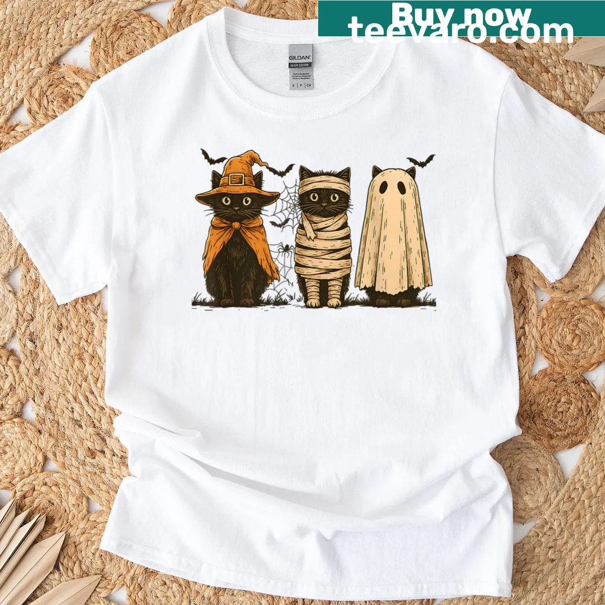 Retro black cat, pumpkin, and ghost design for Halloween — on a men's t-shirt