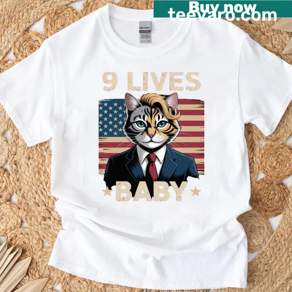 Playful shirt featuring a cartoon cat celebrating 9 lives with humor