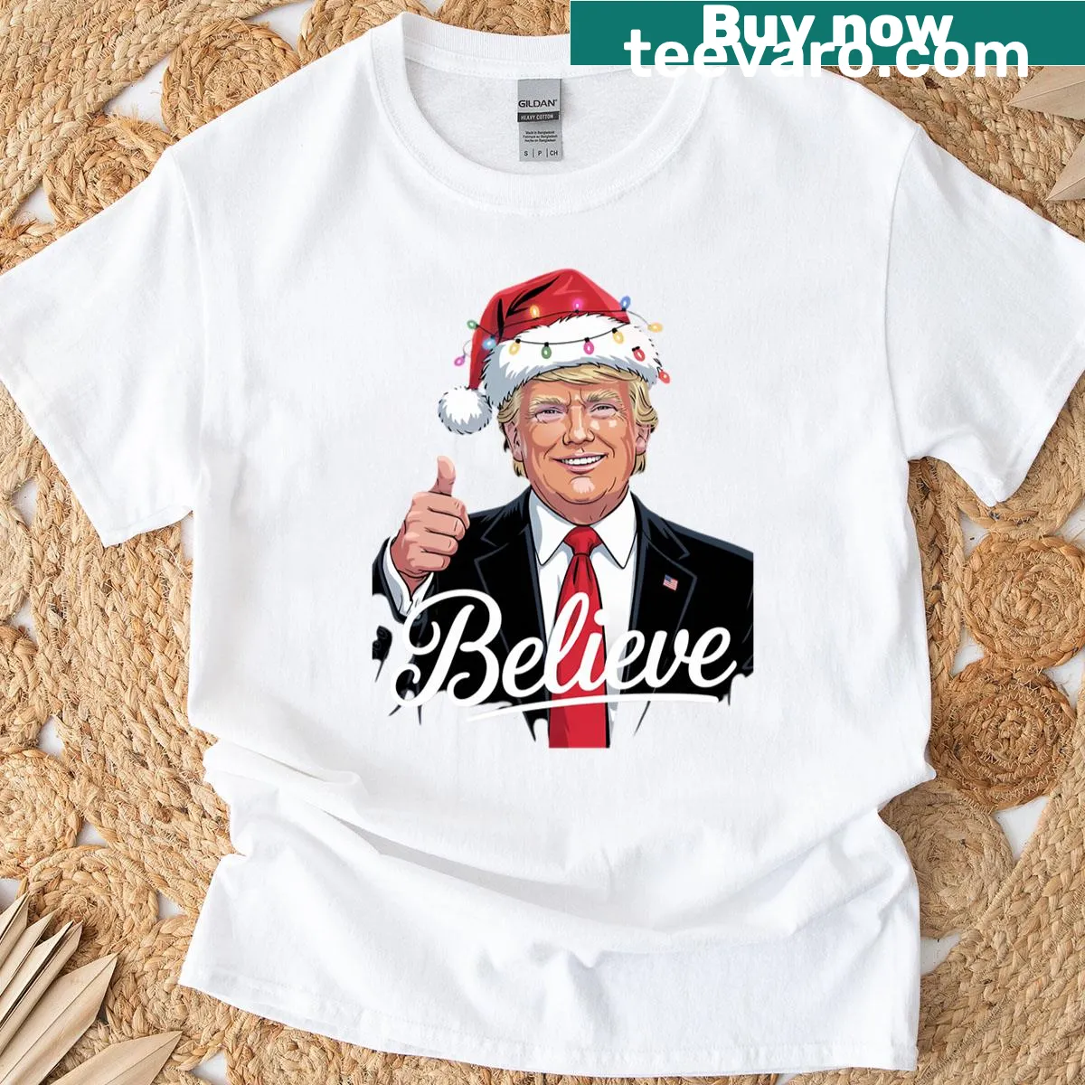 Christmas T-shirt featuring Santa Claus and the word 'Bilieve' — on a men's t-shirt