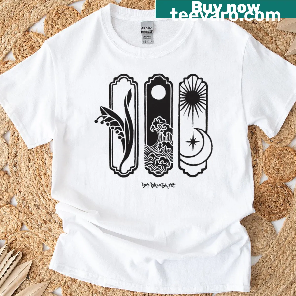 Minimalist linocut print of Earth, sea, and sky on T-shirt — on a men's t-shirt