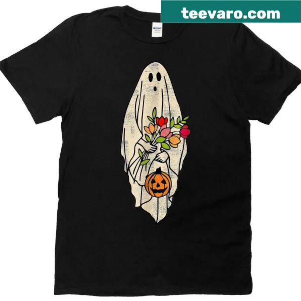 Whimsical ghost surrounded by floral designs on a T-shirt