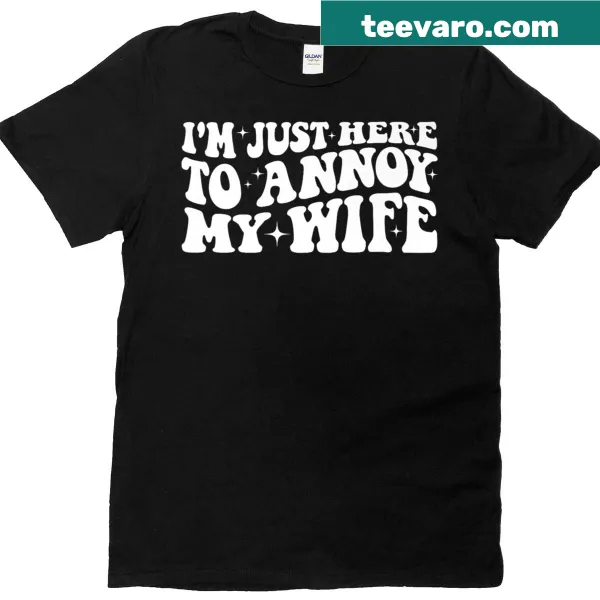 Sarcastic t-shirt saying 'I’m Just Here To Annoy My Wife' in groovy font
