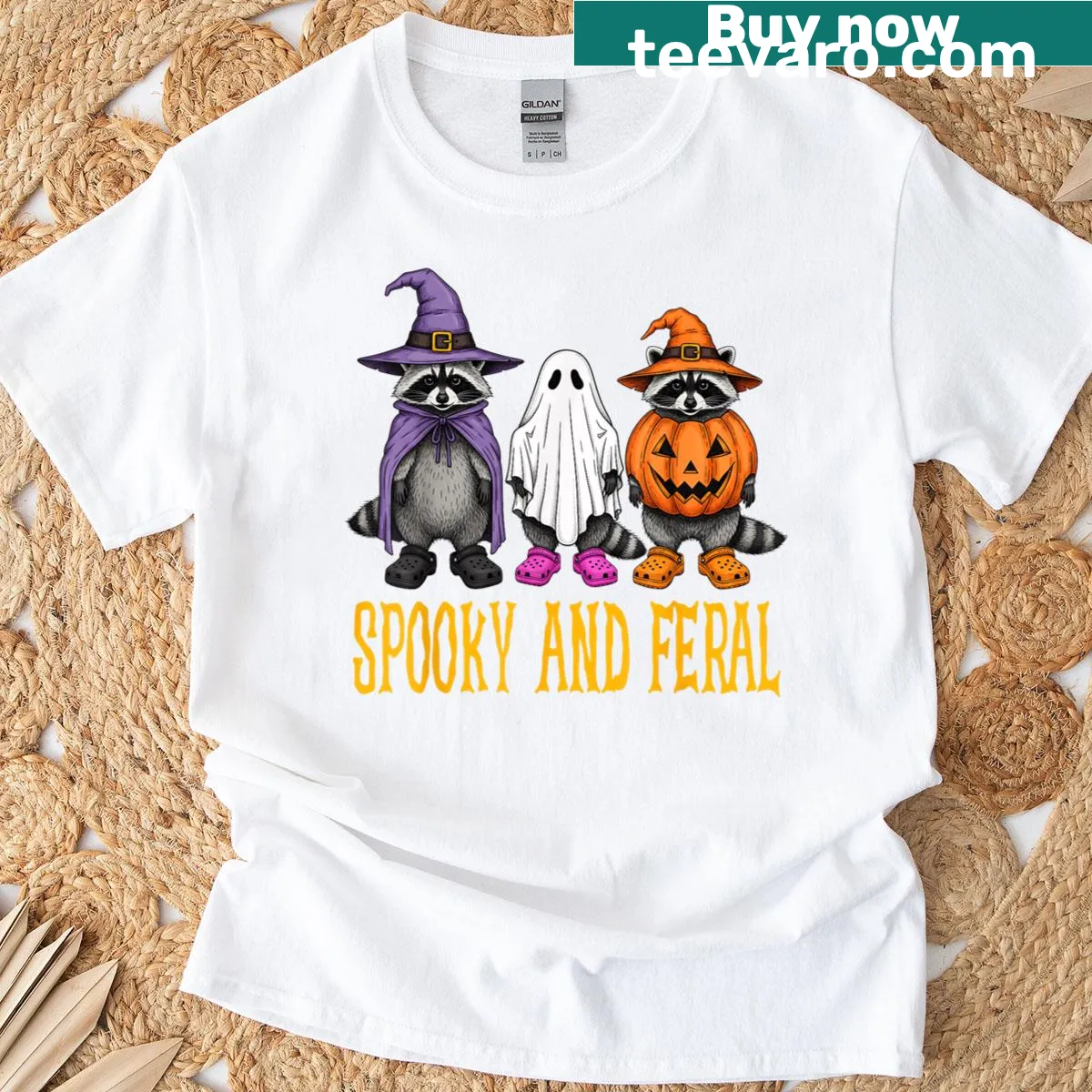 Halloween t-shirt featuring a raccoon in costume with matching text — on a men's t-shirt