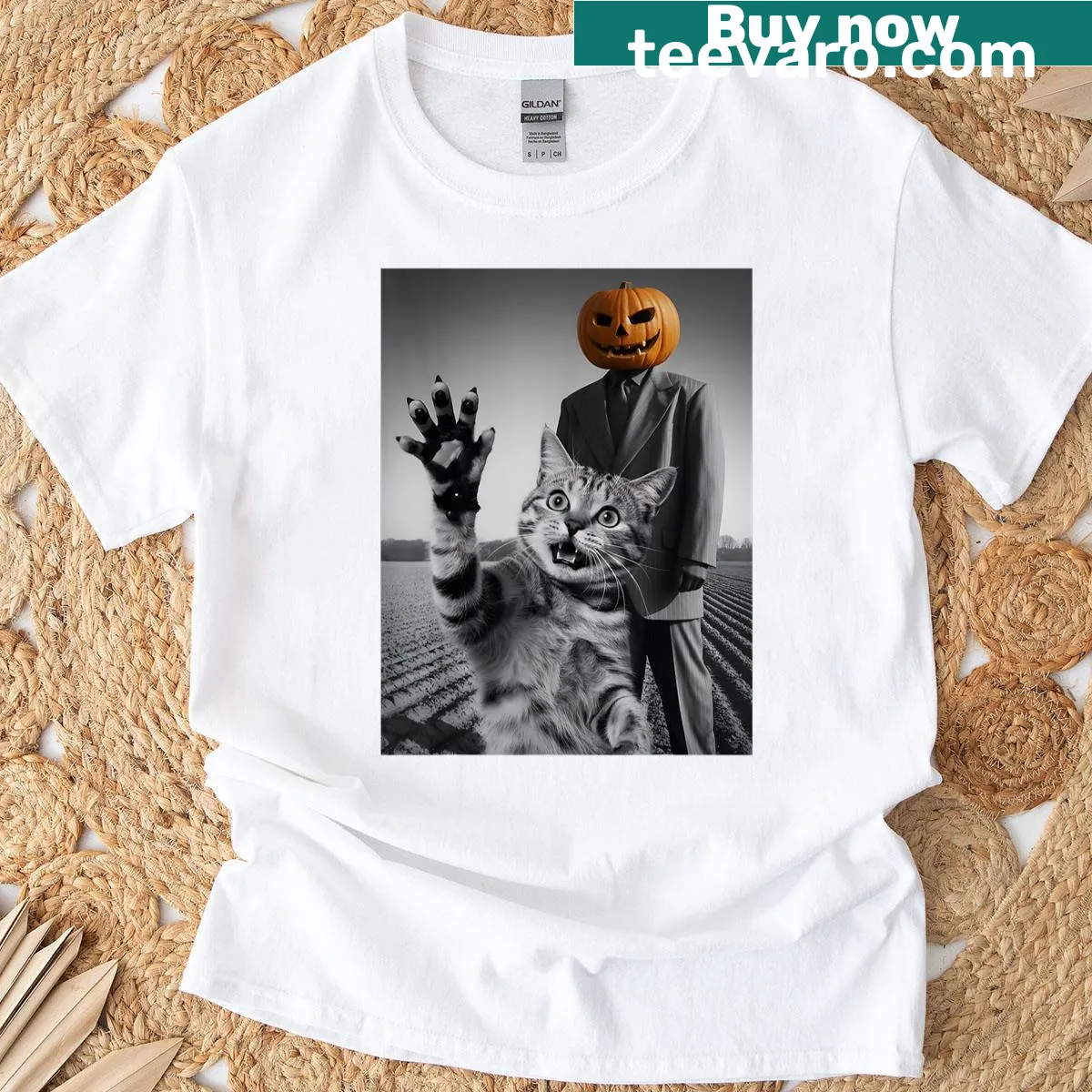 Illustration of a scared cat hiding behind a pumpkin for Halloween, designed for cat lovers. — on a men's t-shirt