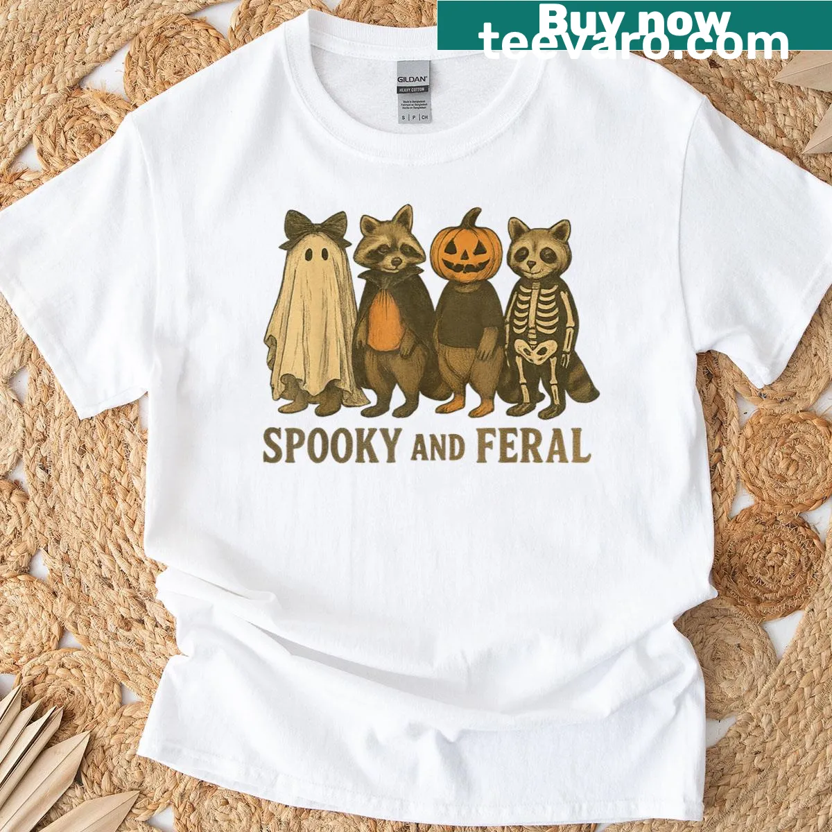 Illustrated spooky raccoon graphic on a Halloween-themed t-shirt — on a men's t-shirt