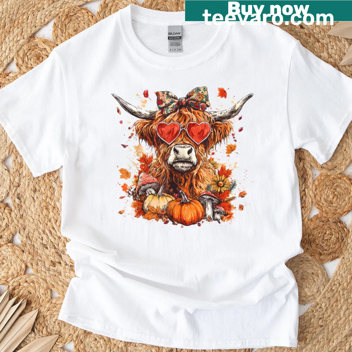 Autumn-themed Highland cow graphic tee — on a men's t-shirt