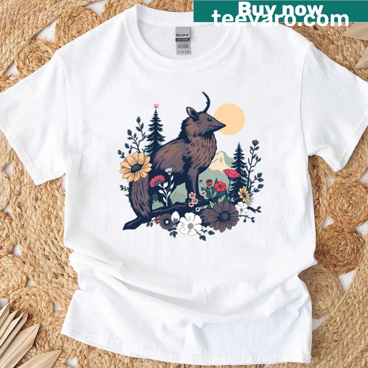 Mystical deer with wildflowers and mountains design — on a men's t-shirt