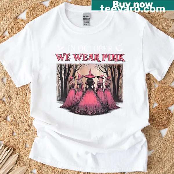 Pink witch graphic promoting breast cancer awareness on shirt
