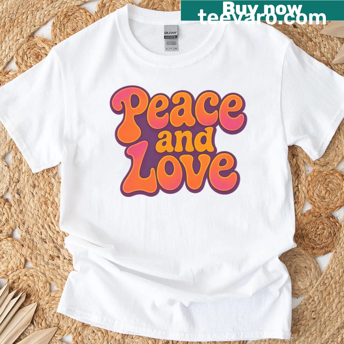 1960s inspired T-shirt featuring the quote 'Peace and Love' in bold typography — on a men's t-shirt