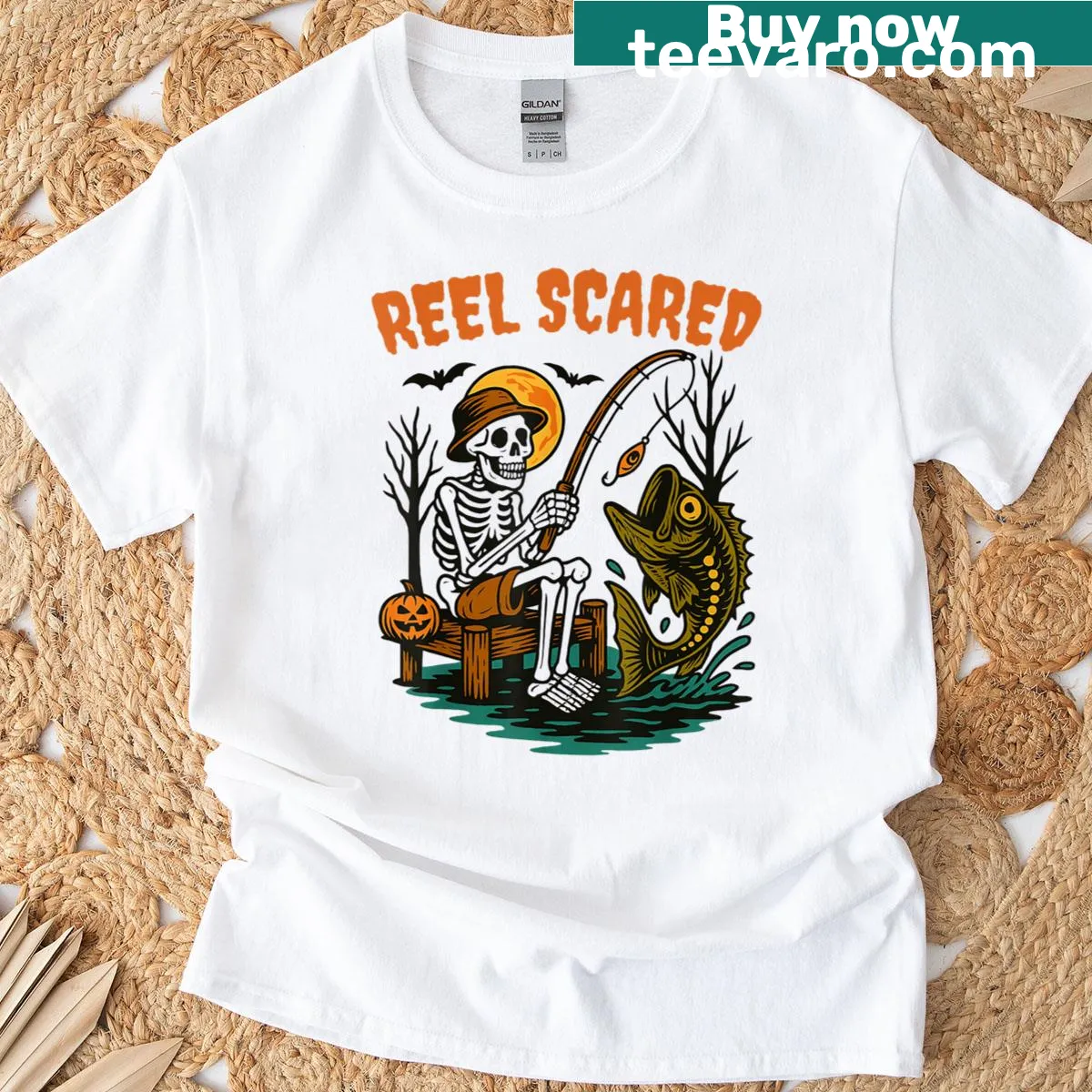 Funny Halloween T-shirt with a skeleton fisherman and bass fish — on a men's t-shirt