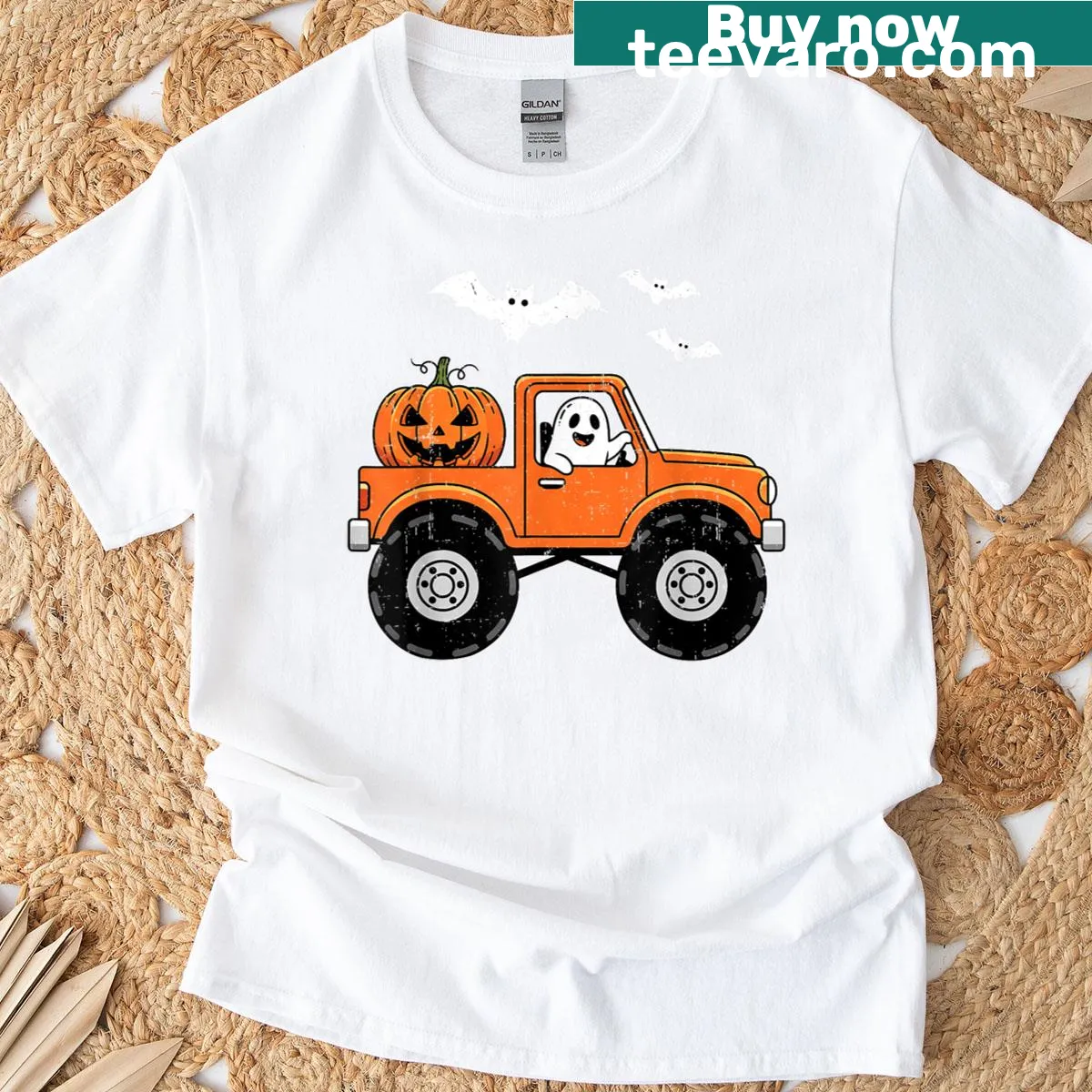Funny Halloween T-shirt with a monster truck and pumpkin illustration for kids. — on a men's t-shirt