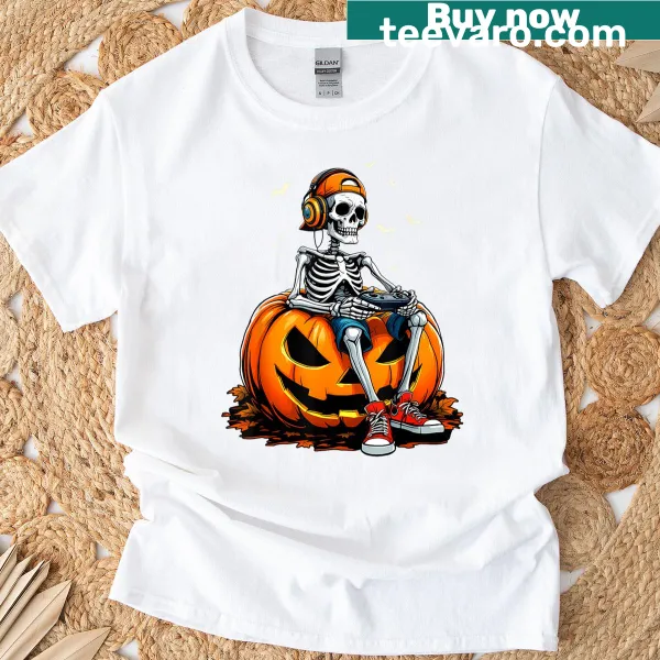 Cartoon skeleton gamer with a pumpkin head on a kids' t-shirt.
