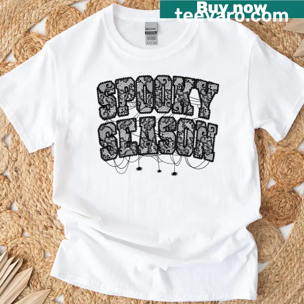 Halloween-themed t-shirt with lace patterns and festive designs