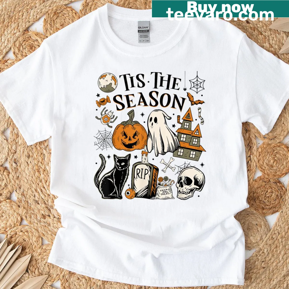 Charming T-shirt featuring Halloween symbols like a ghost, pumpkin, witch, and black cat. — on a men's t-shirt