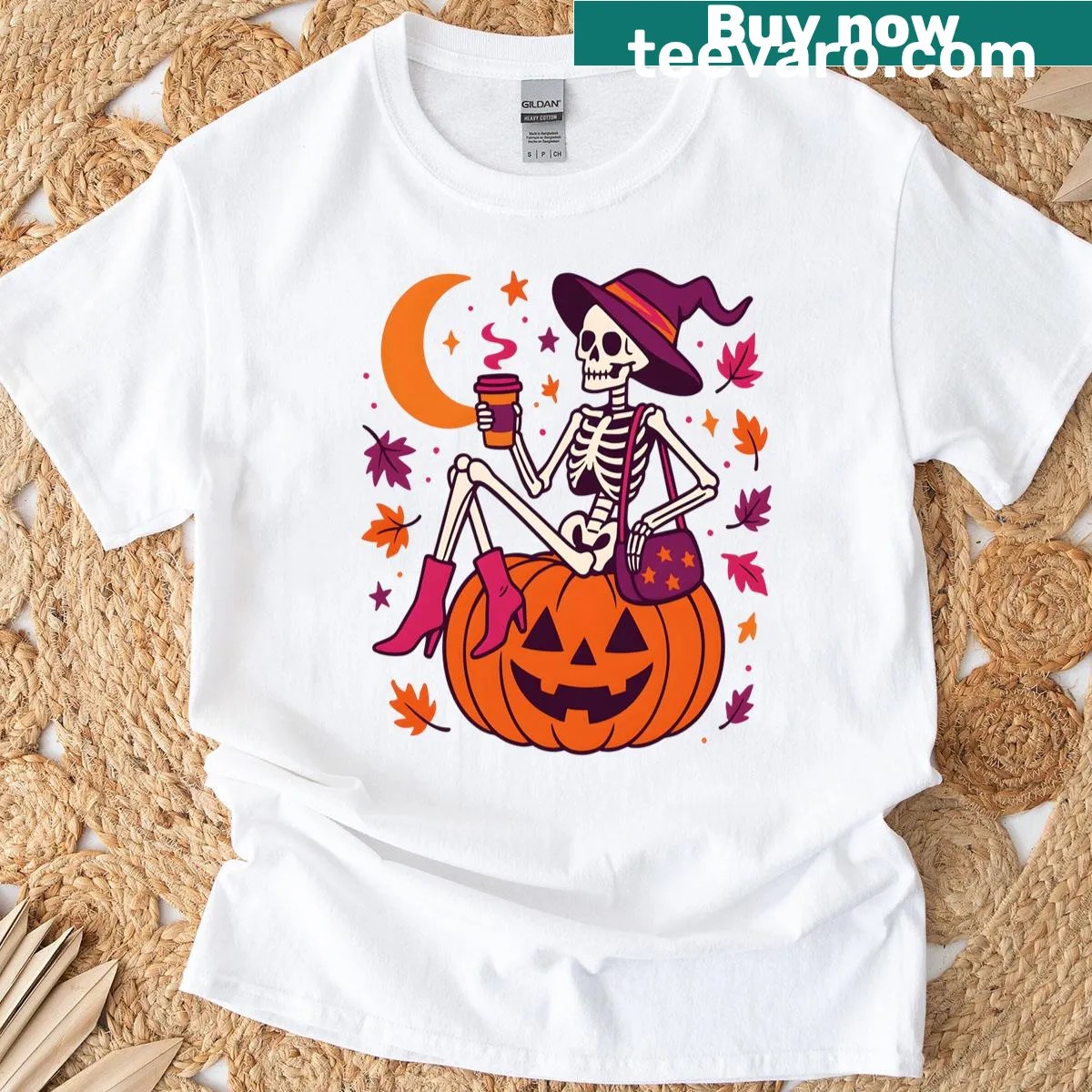 Illustration of a witchy skeleton with a pumpkin and coffee for Halloween — on a men's t-shirt
