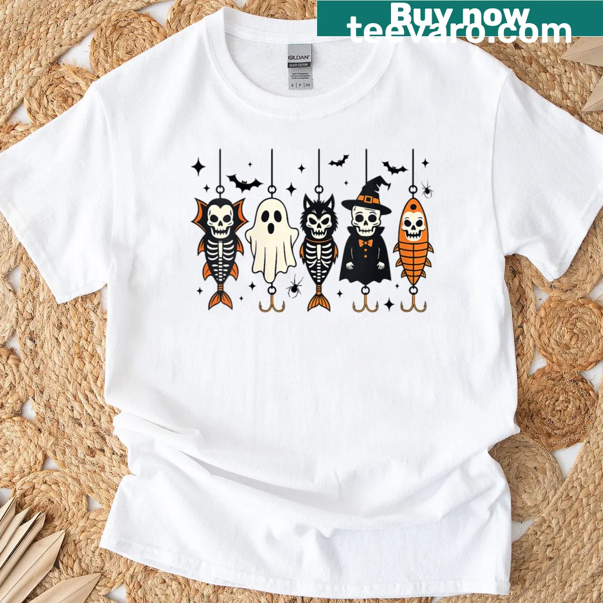 Halloween-themed fisherman t-shirt with skeleton and monster illustrations — on a men's t-shirt