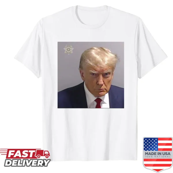 Illustration of Trump in a humorous mugshot style on a t-shirt
